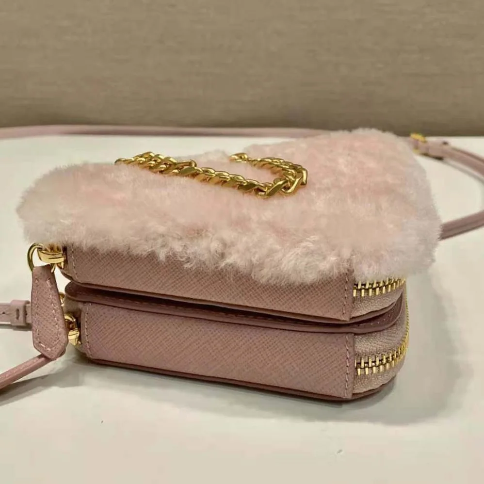 Prada Shearling and Saffiano Leather Mini-Pouch for Women in Pink Prada Shearling and Saffiano Leather Mini-Pouch for Women in Pink