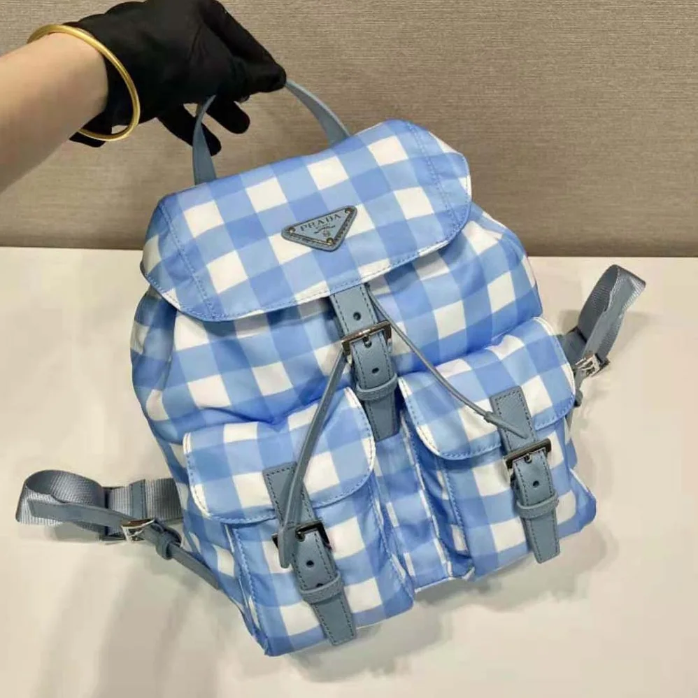 Prada Small Printed Re-Nylon Backpack for Women in Blue Prada Small Printed Re-Nylon Backpack for Women in Blue