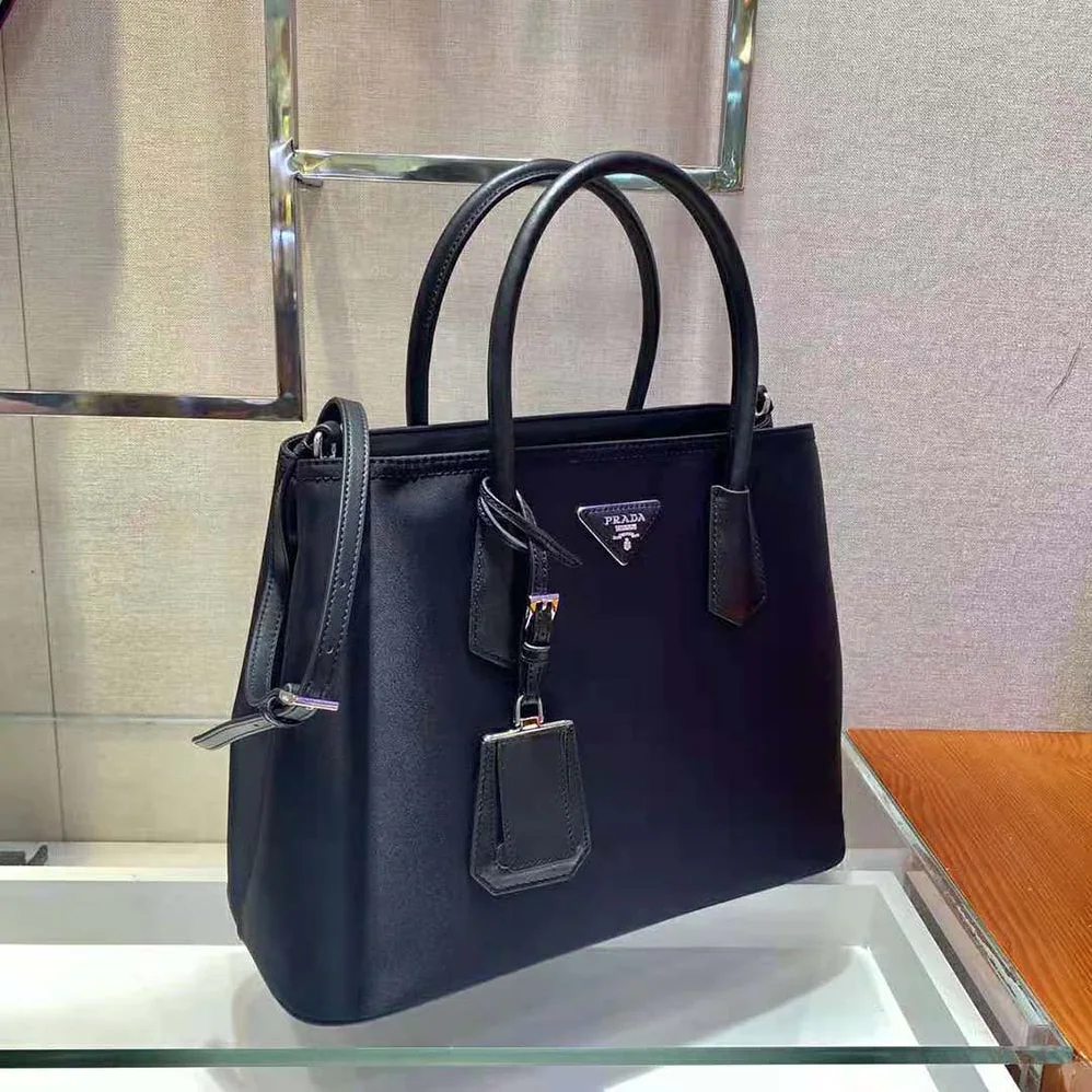 Prada Prada Double nylon and Saffiano Leather Bag for Women in Black
