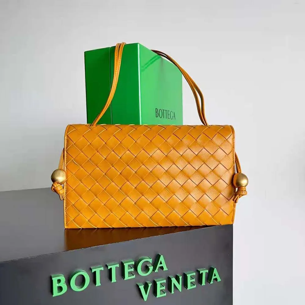 Bottega Veneta Trio Pouch On Strap Mini Intrecciato Leather Shoulder Bag for Women in Orange Bottega Veneta Trio Pouch On Strap Mini Intrecciato Leather Shoulder Bag for Women in Orange