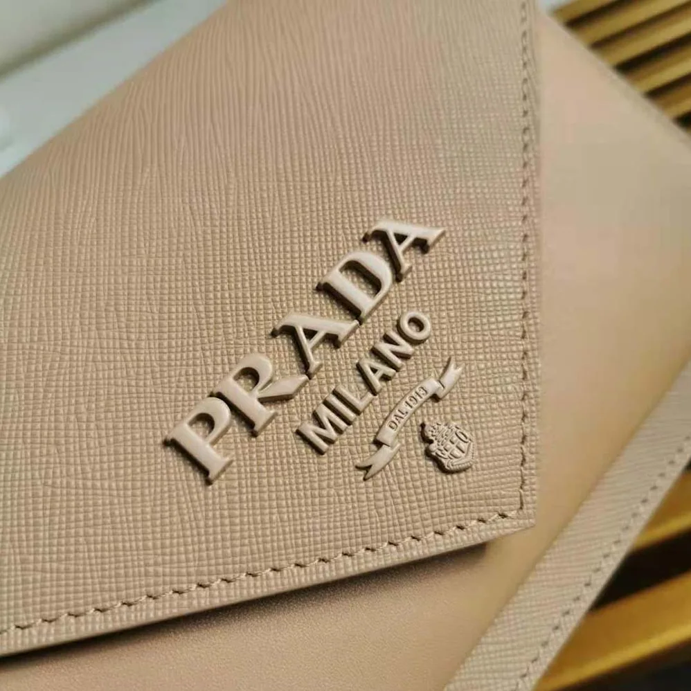 Prada Ladies Saffiano Leather Mini Bag in Sandy Prada Ladies Saffiano Leather Mini Bag in Sandy