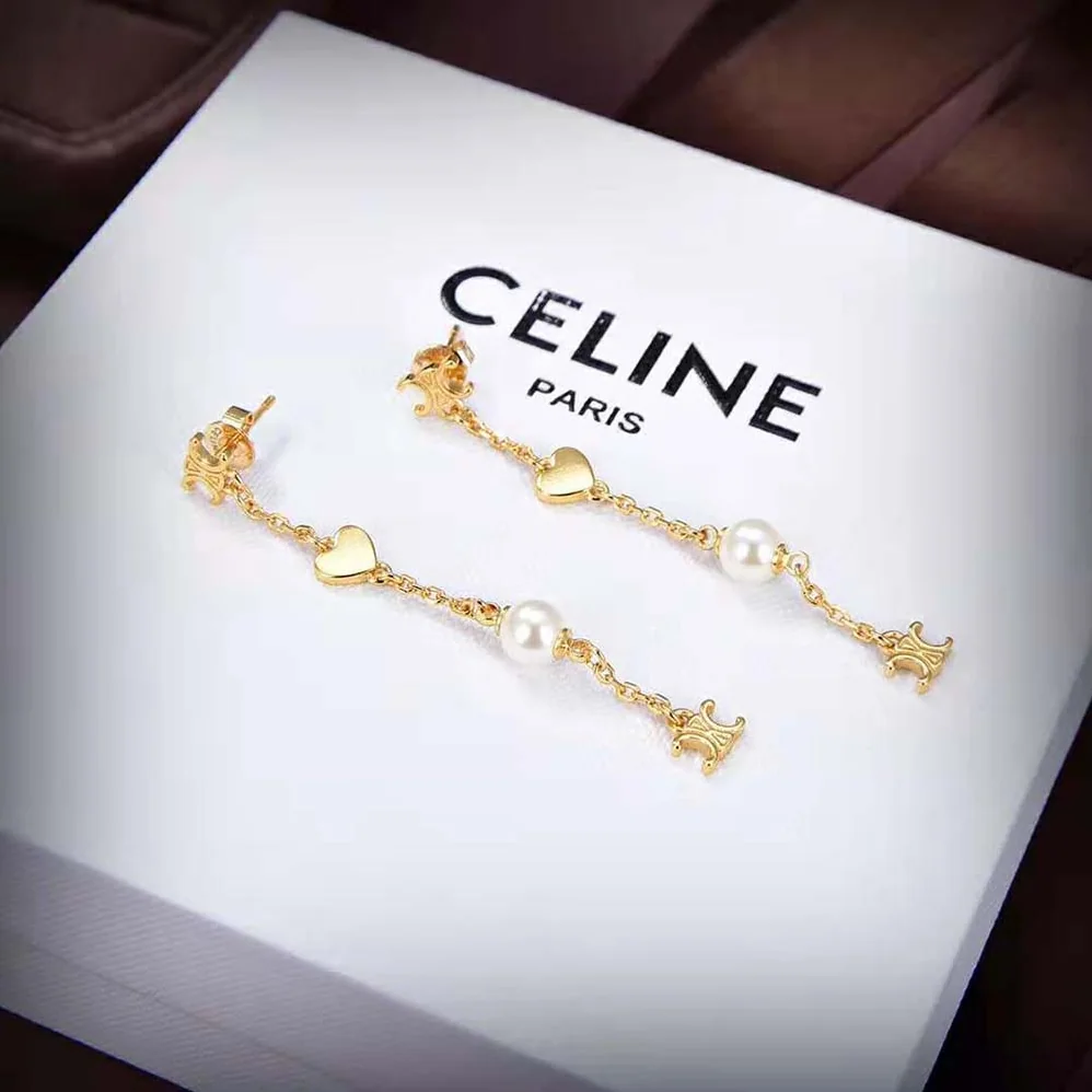 Celine Cœur Celine Charms Earrings in Brass with Gold Finish and Resin Pearl for Women Celine Cœur Celine Charms Earrings in Brass with Gold Finish and Resin Pearl for Women