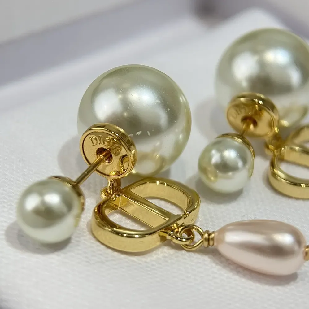 Dior Petit CD Earrings Gold-Finish Metal and Iridescent Pink Resin Pearls for Women Dior Petit CD Earrings Gold-Finish Metal and Iridescent Pink Resin Pearls for Women