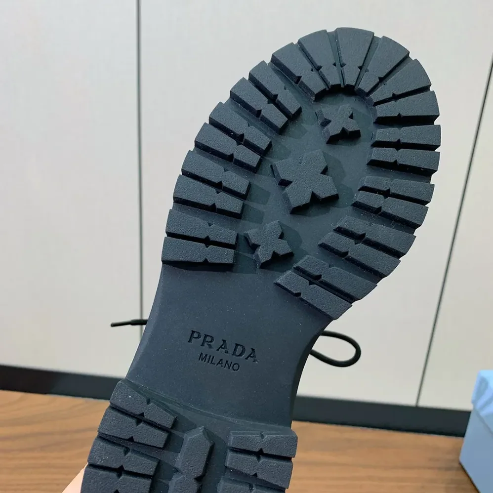 Prada Leather and Re-Nylon booties for Unisex in Cognac