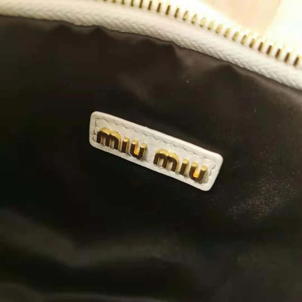 Miu Miu Wander Matelassé Nappa Leather Hobo Bag for Women in White Miu Miu Wander Matelassé Nappa Leather Hobo Bag for Women in White