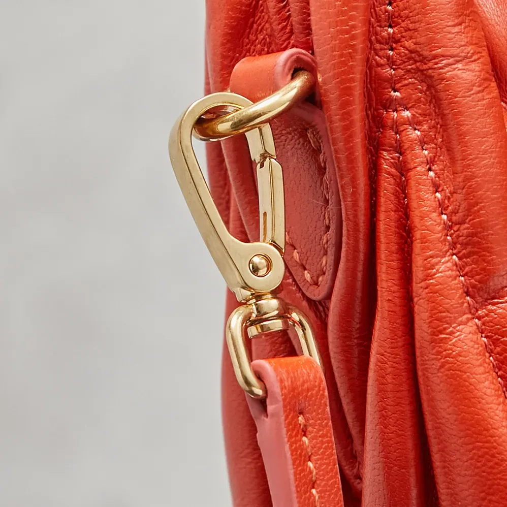 Miu Miu Wander Matelassé Nappa Leather Hobo Bag for Women in Orange Miu Miu Wander Matelassé Nappa Leather Hobo Bag for Women in Orange