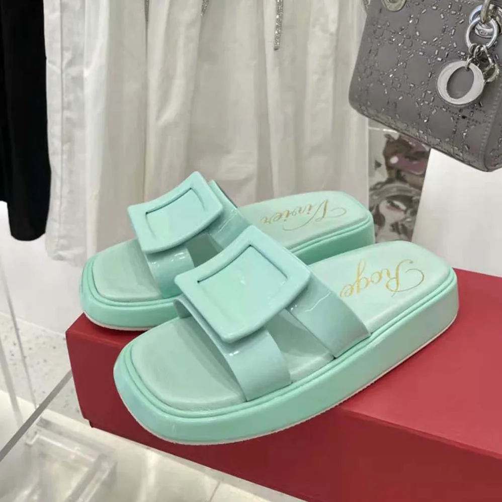 Roger Vivier Vivier Slide Covered Buckle Mules in Patent Leather for Women in Aqua Roger Vivier Vivier Slide Covered Buckle Mules in Patent Leather for Women in Aqua