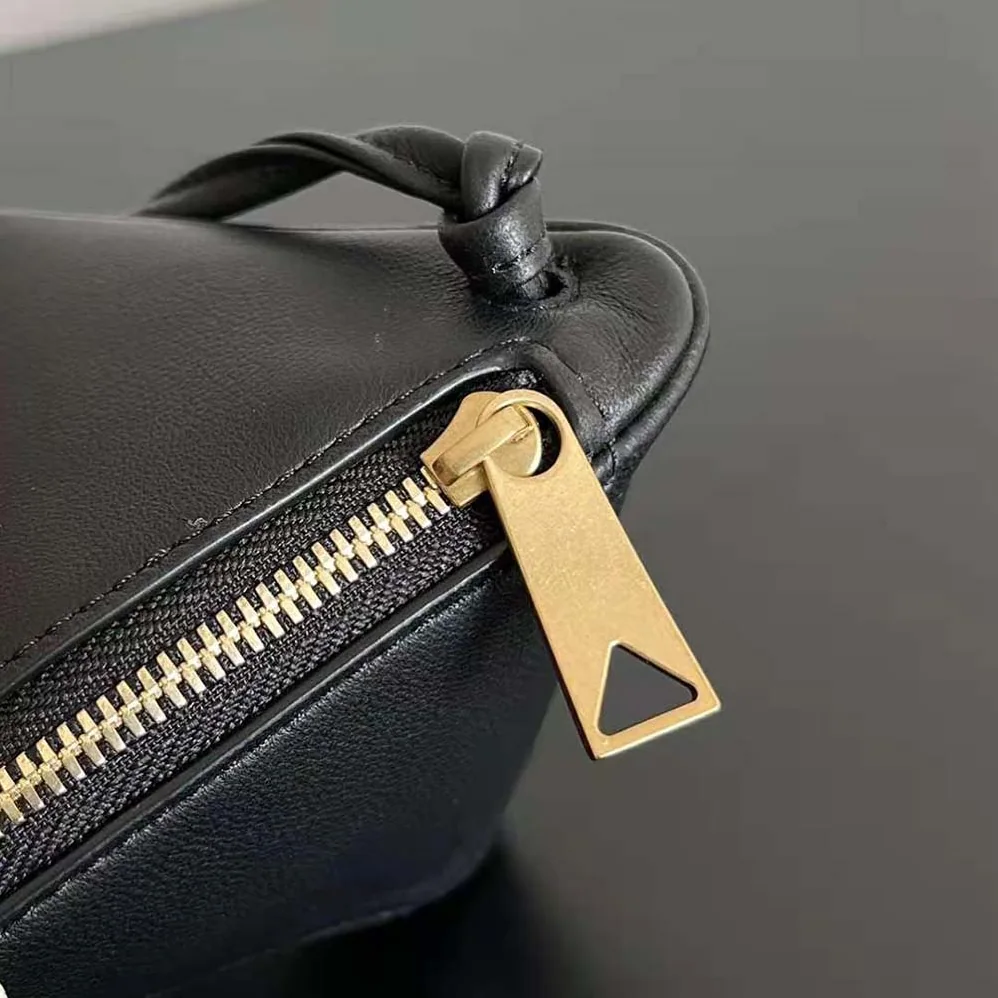 Bottega Veneta Intrecciato Leather Multi Pouch On Strap for Women in Black Bottega Veneta Intrecciato Leather Multi Pouch On Strap for Women in Black