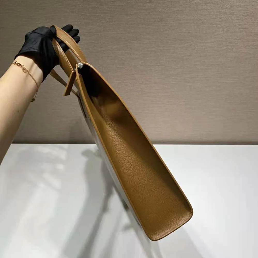 Prada Saffiano Leather Tote with a Crosshatch Pattern and Wax Finish for Men in Brown
