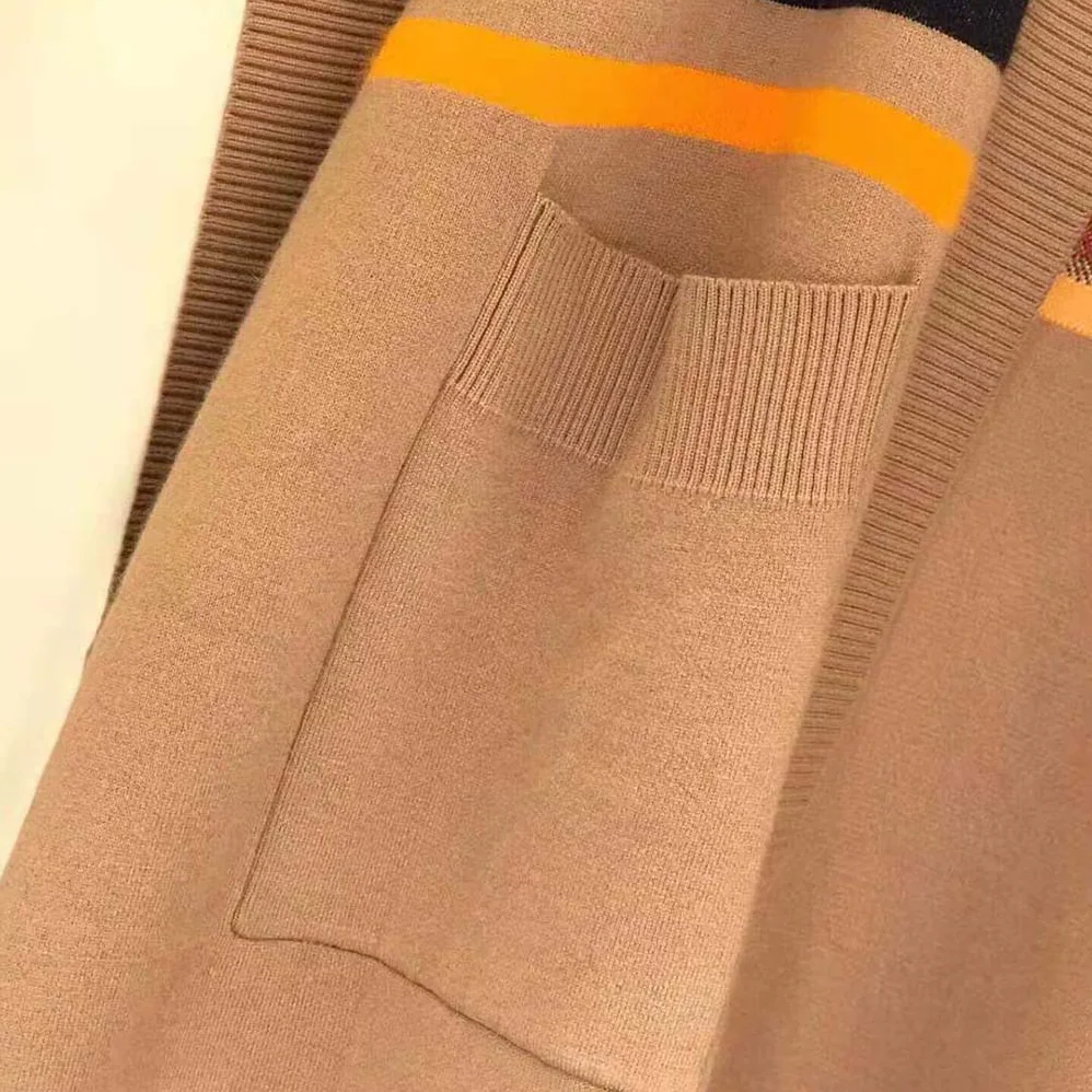 Burberry Monogram Motif Lntarsia Wool Cashmere Blend Cape for Women in Brown Burberry Monogram Motif Lntarsia Wool Cashmere Blend Cape for Women in Brown