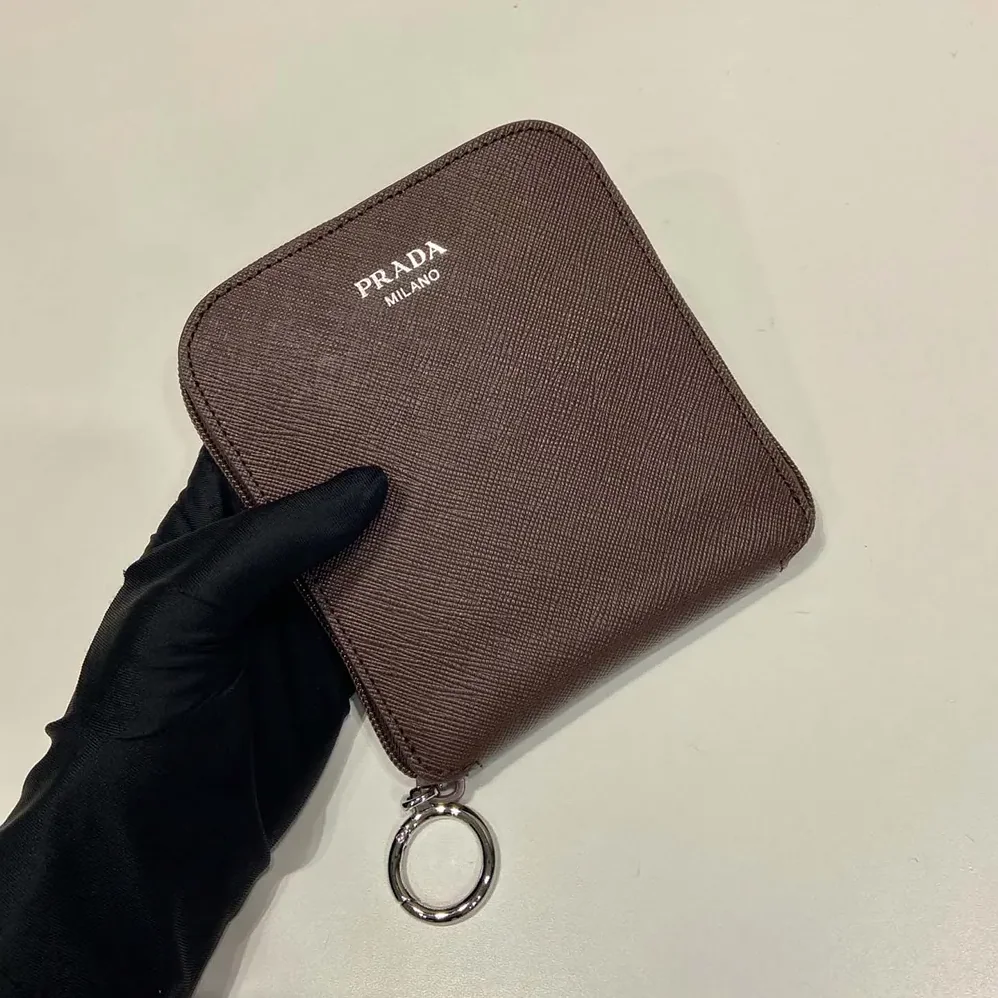 Prada Saffiano Leather Pendant With Re-Nylon Tote Bag for Women in Sienna Prada Saffiano Leather Pendant With Re-Nylon Tote Bag for Women in Sienna