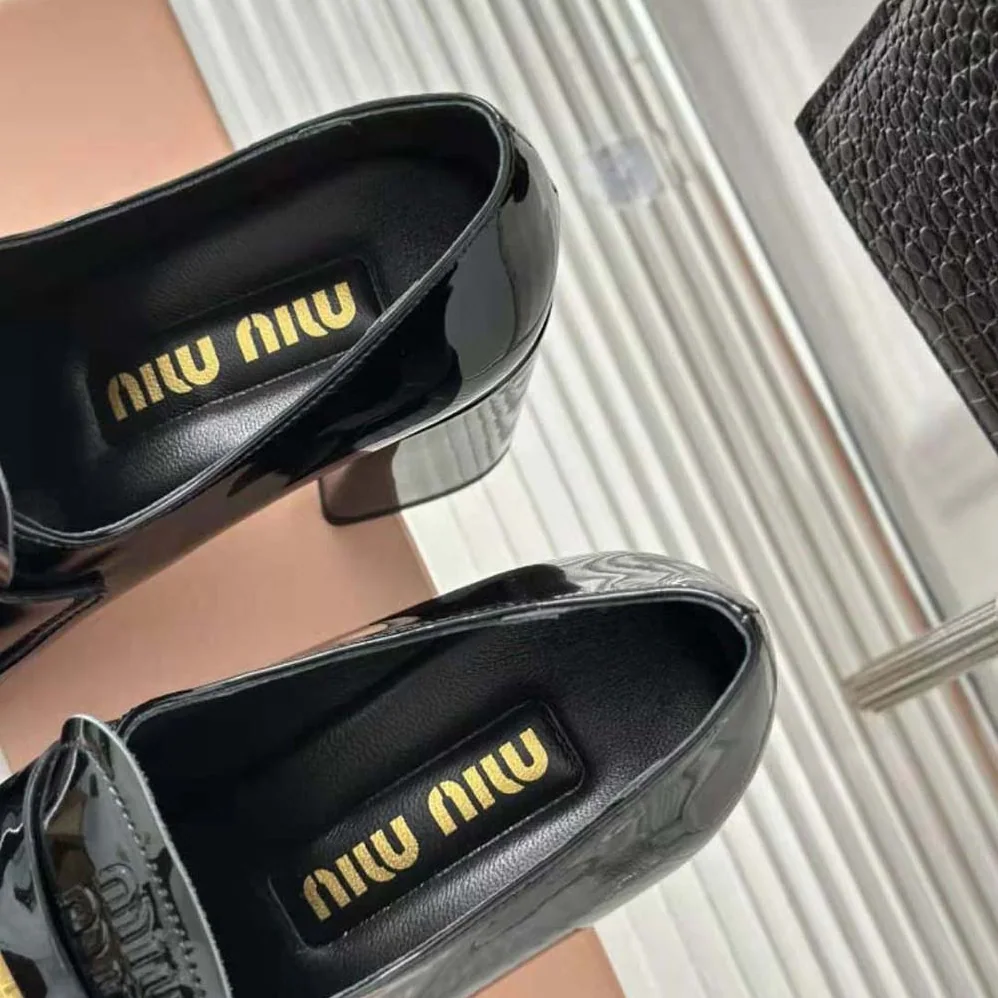 Miu Miu Patent Leather Loafers with Embossed Logo on the Tongue for Women in Black Miu Miu Patent Leather Loafers with Embossed Logo on the Tongue for Women in Black