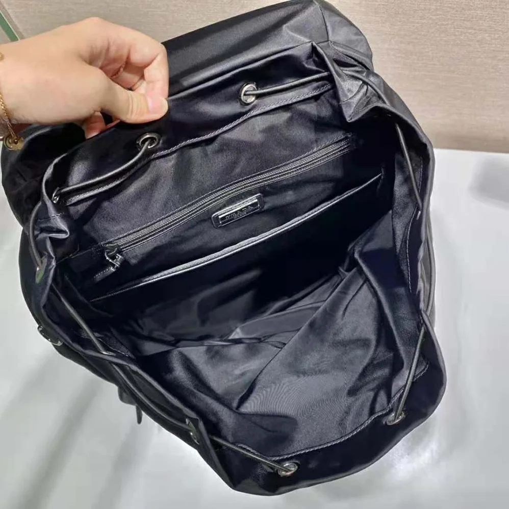 Prada Re-Nylon and Saffiano Leather Backpack with Triangle Logo for Unisex in Black