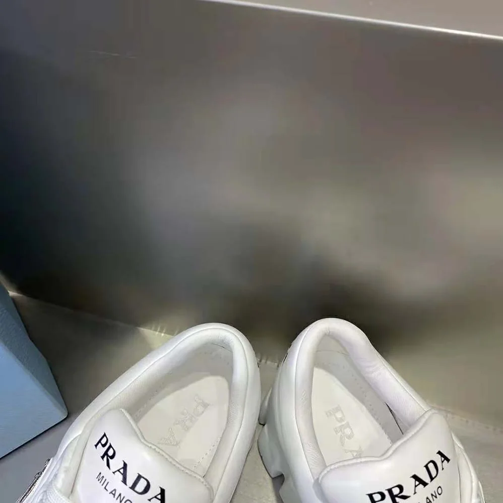 Prada Soft Padded Nappa Leather Lace-up Shoes for Women in White Prada Soft Padded Nappa Leather Lace-up Shoes for Women in White