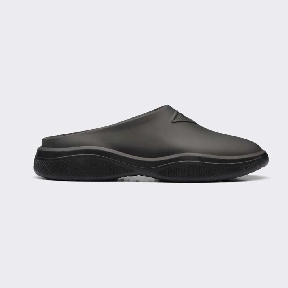 Prada Foam Rubber Mules With Embossed Rubber Triangle Logo for Women in Black Prada Foam Rubber Mules With Embossed Rubber Triangle Logo for Women in Black