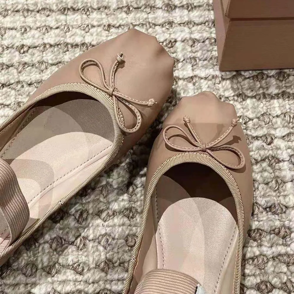 Miu Miu Leather Ballerinas with Fabric Logo Label for Women in Beige