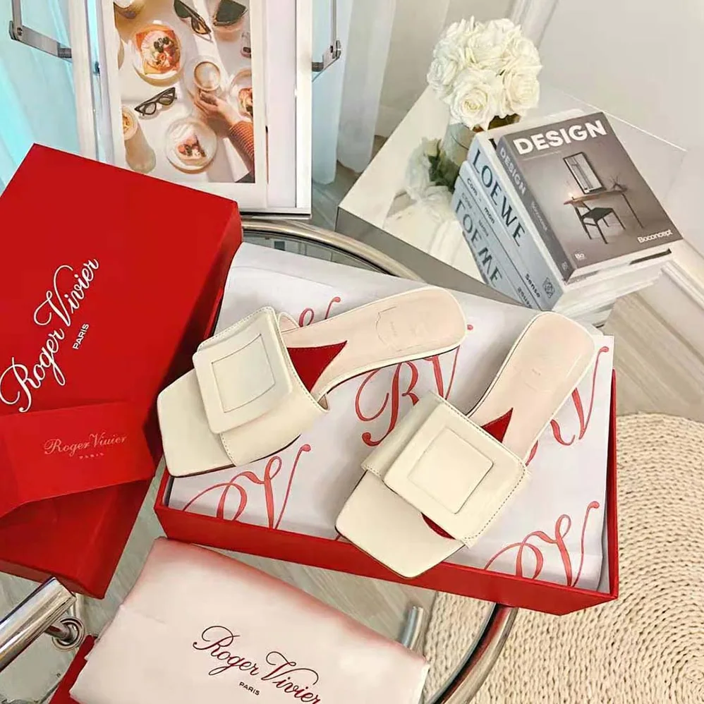 Roger Vivier Covered Buckle Mules in Patent Leather for Women in White Roger Vivier Covered Buckle Mules in Patent Leather for Women in White