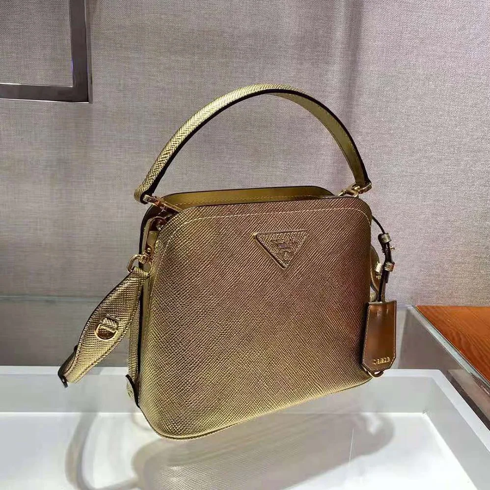 Prada Prada Matinee Micro Saffiano Leather Bag for Women in Gold Prada Prada Matinee Micro Saffiano Leather Bag for Women in Gold