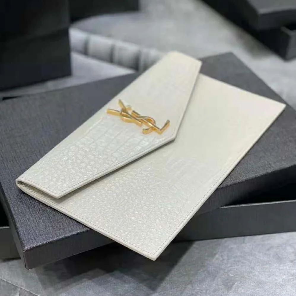 Saint Laurent YSL Uptown Pouch in Crocodile Embossed Shiny Leather for Women in Gold Saint Laurent YSL Uptown Pouch in Crocodile Embossed Shiny Leather for Women in Gold