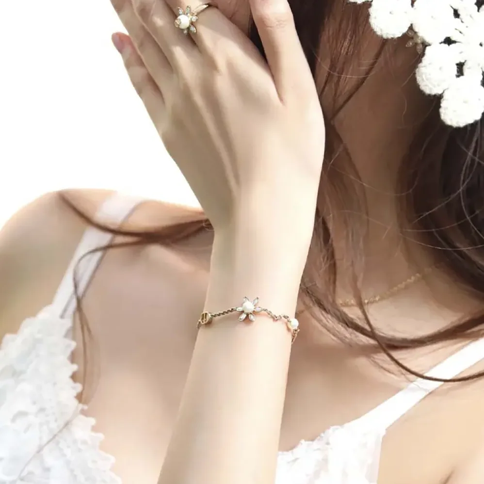 Dior Bloom in Dior Bracelet Gold-Finish Metal with White Resin Pearls and Silver for Women in Tone Crystals Dior Bloom in Dior Bracelet Gold-Finish Metal with White Resin Pearls and Silver for Women in Tone Crystals