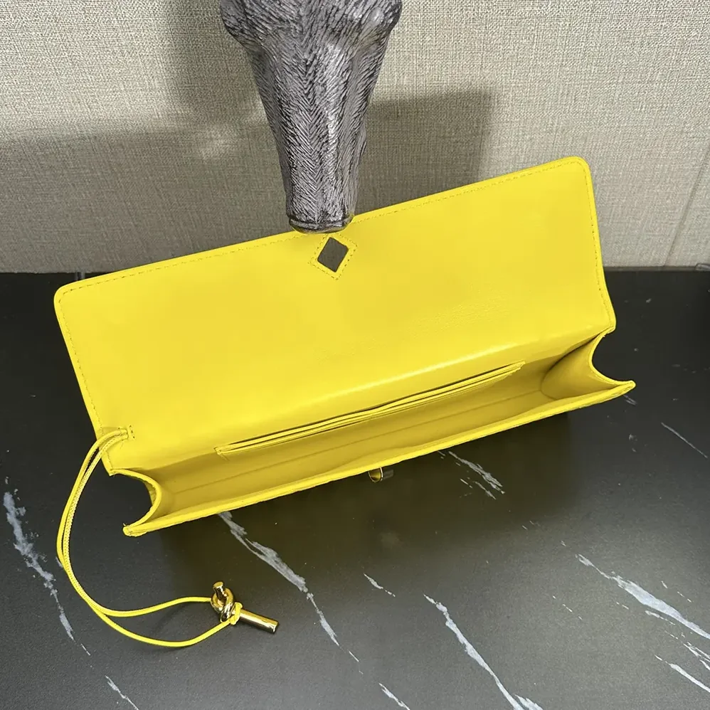 Bottega Veneta Andiamo Clutch in Intrecciato Leather for Women in Yellow Bottega Veneta Andiamo Clutch in Intrecciato Leather for Women in Yellow