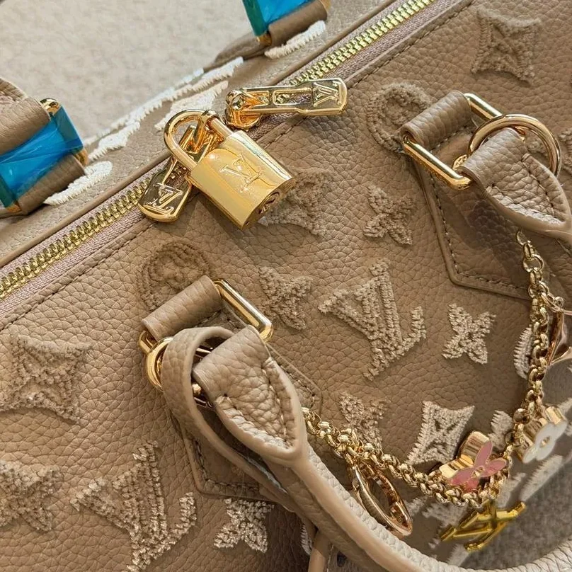 Louis Vuitton Speedy Bandouliere 25 Top Handle Bag in Light Brown