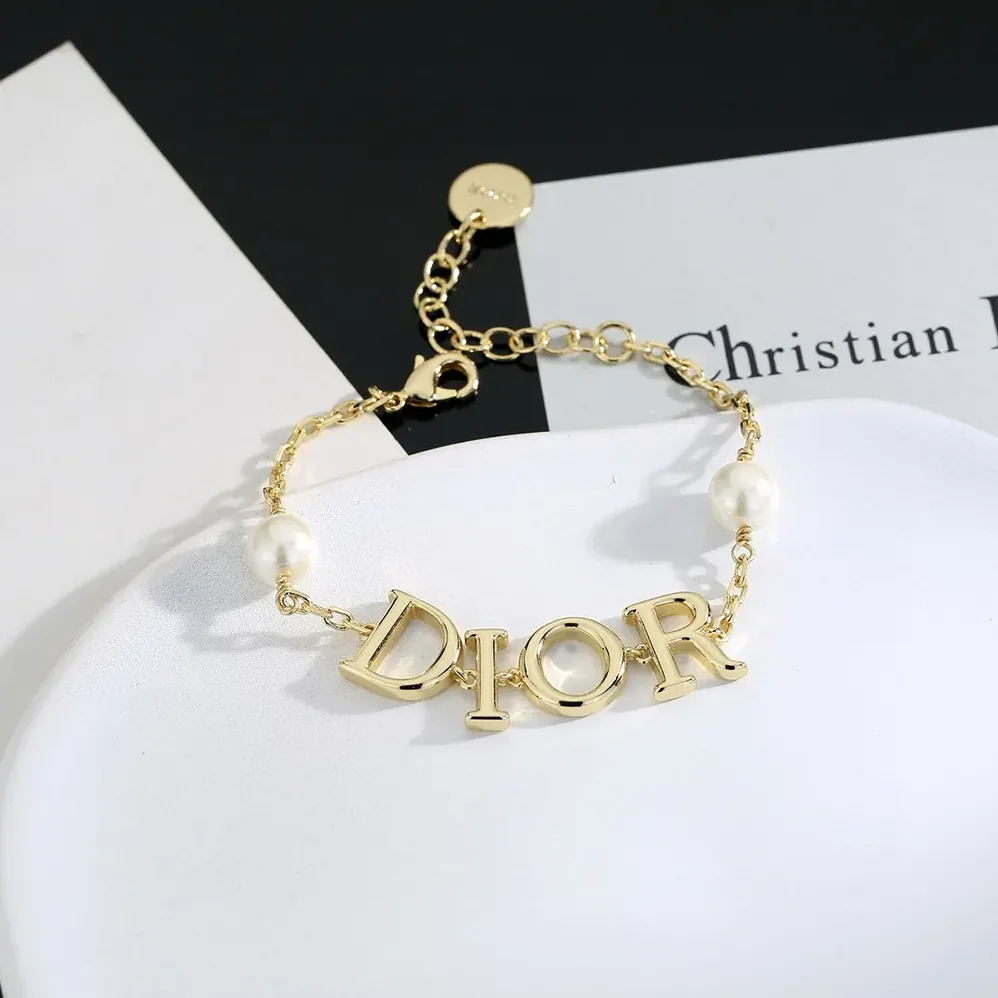 Dior Dio(r)evolution Bracelet Gold-Finish Metal and White Resin Pearls for Women Dior Dio(r)evolution Bracelet Gold-Finish Metal and White Resin Pearls for Women