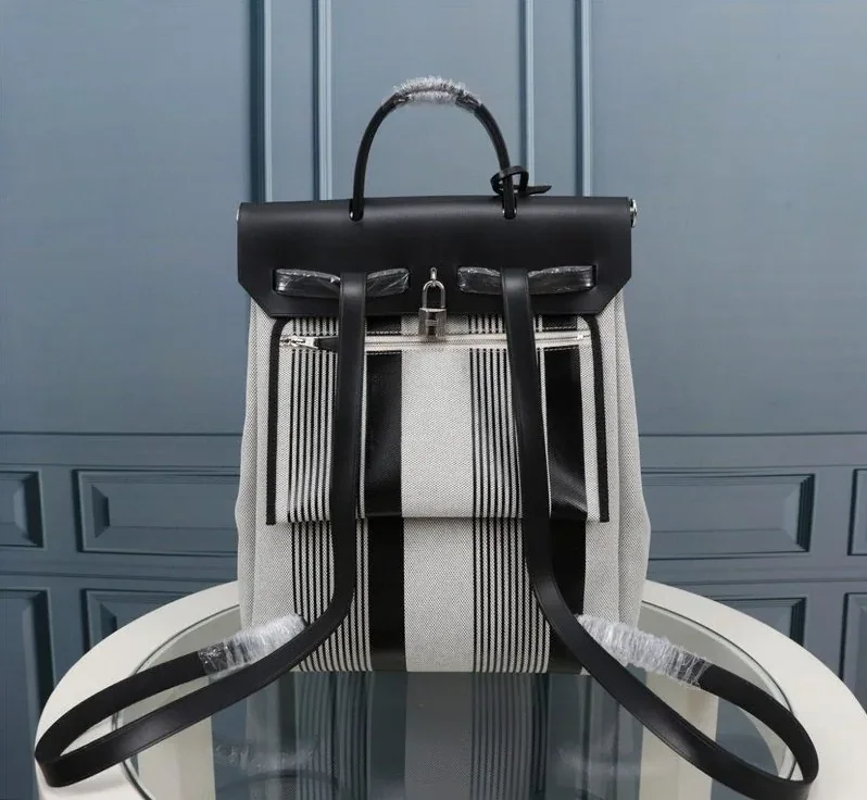 Hermes Buckle Lock Shape Striped Silver Toned Hardware Bag Hermes Buckle Lock Shape Striped Silver Toned Hardware Bag