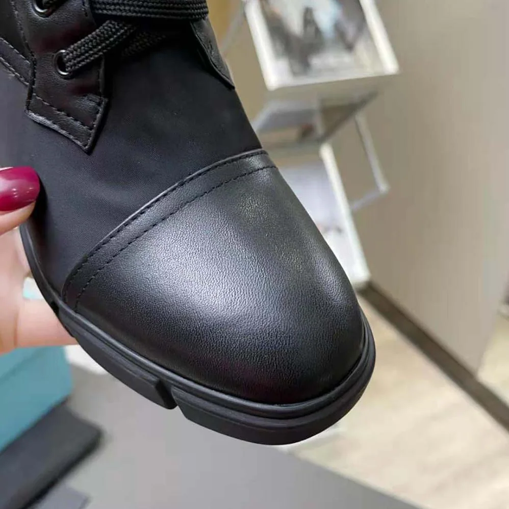Prada Brushed Leather and Nylon Booties for Women in Black Prada Brushed Leather and Nylon Booties for Women in Black
