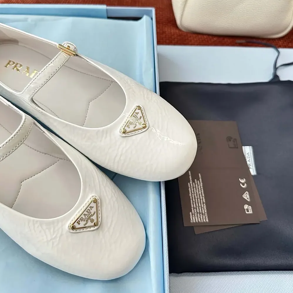 Prada Naplak Patent Leather Ballerinas for Women in White Prada Naplak Patent Leather Ballerinas for Women in White