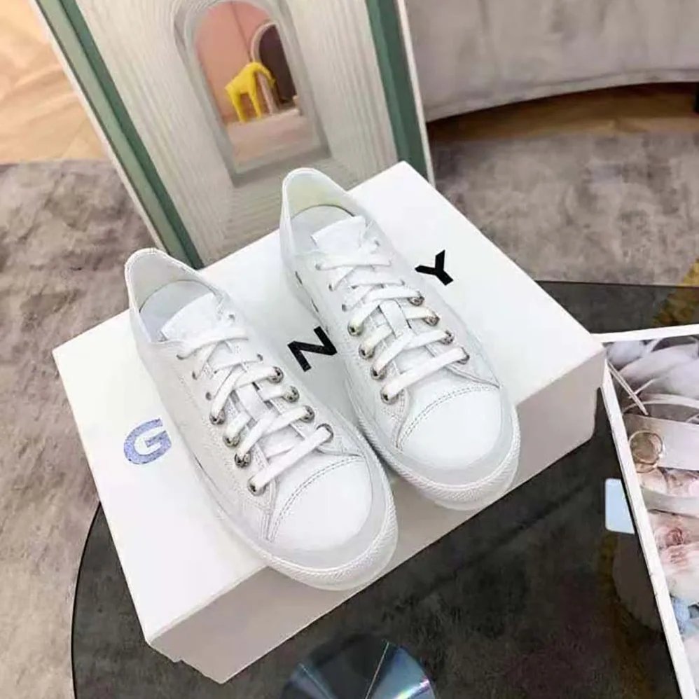 Givenchy Sneakers City in Canvas and Leather for Women in White Givenchy Sneakers City in Canvas and Leather for Women in White