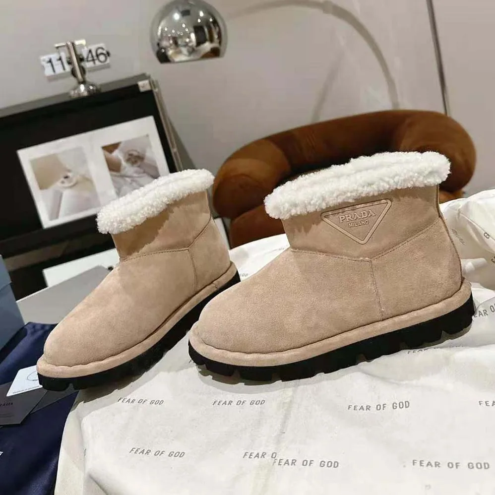 Prada Shearling Booties with Rubber Triangle Logo for Unisex Prada Shearling Booties with Rubber Triangle Logo for Unisex