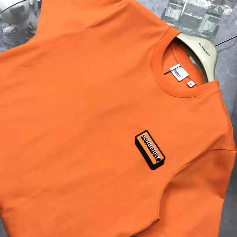 Burberry Logo Appliqué Cotton Oversized T-shirt for Women in Orange Burberry Logo Appliqué Cotton Oversized T-shirt for Women in Orange