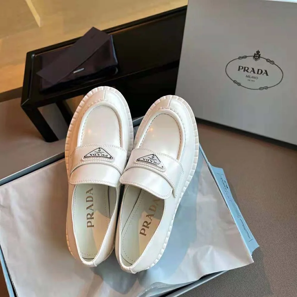 Prada Brushed Leather Loafers for Women in White Prada Brushed Leather Loafers for Women in White