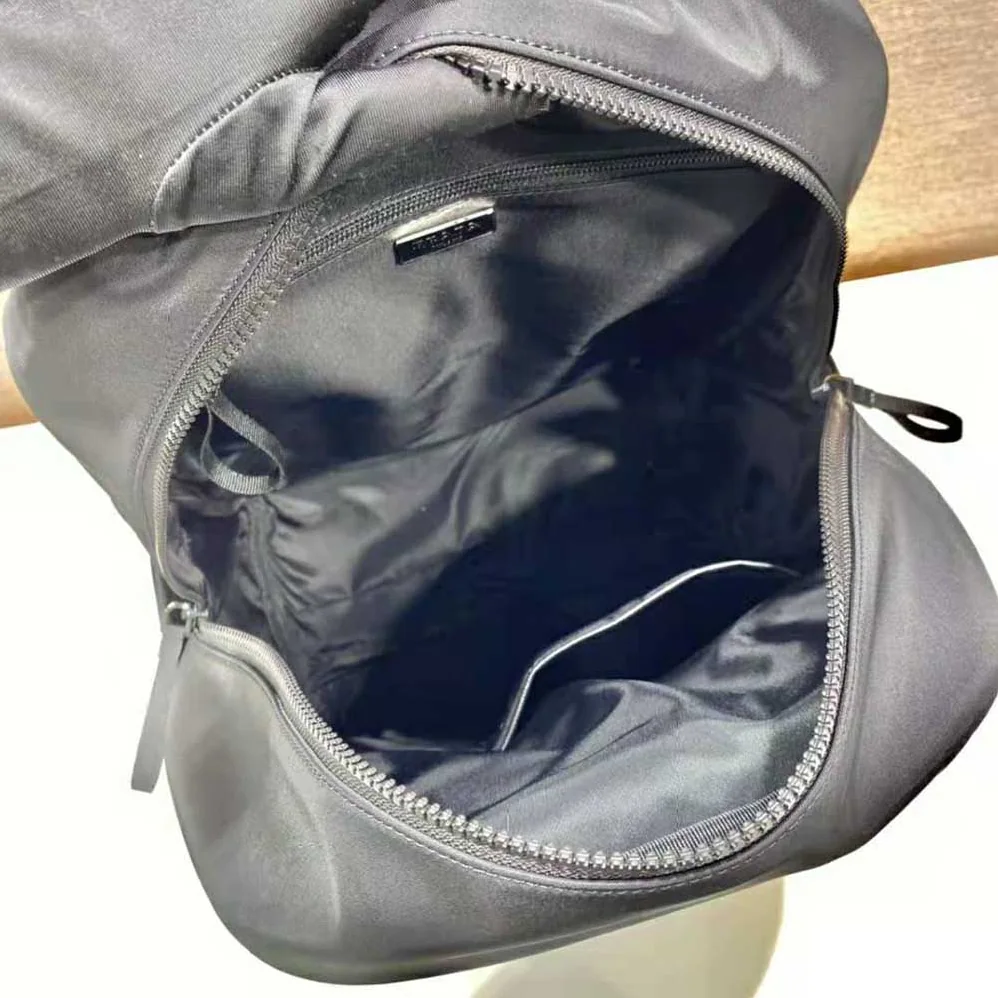 Prada Technical Fabric Backpack with a Functional and Versatile Design for Men in Black