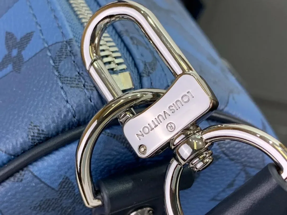 Louis Vuitton Keepall Bandouliere 35 Travel Bag in Blue Silver Hardware