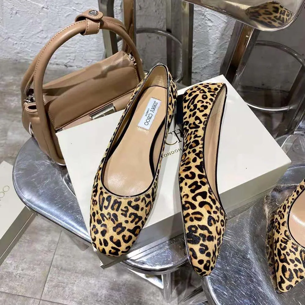 Jimmy Choo Mirele Flat Natural Mix Leopard Print Pony Flats with JC Emblem for Women Jimmy Choo Mirele Flat Natural Mix Leopard Print Pony Flats with JC Emblem for Women