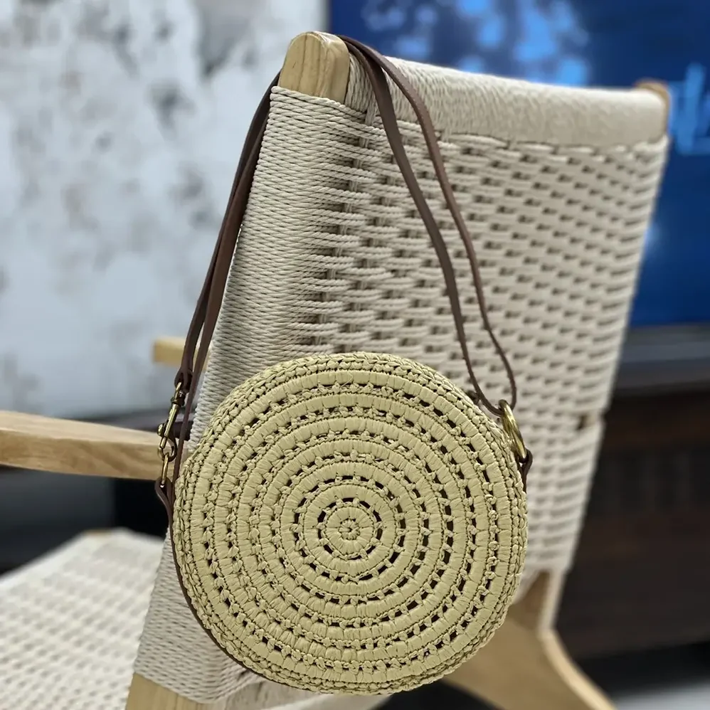 Saint Laurent YSL Round Bag in Raffia and Vegetable for Women in Tanned Leather Saint Laurent YSL Round Bag in Raffia and Vegetable for Women in Tanned Leather
