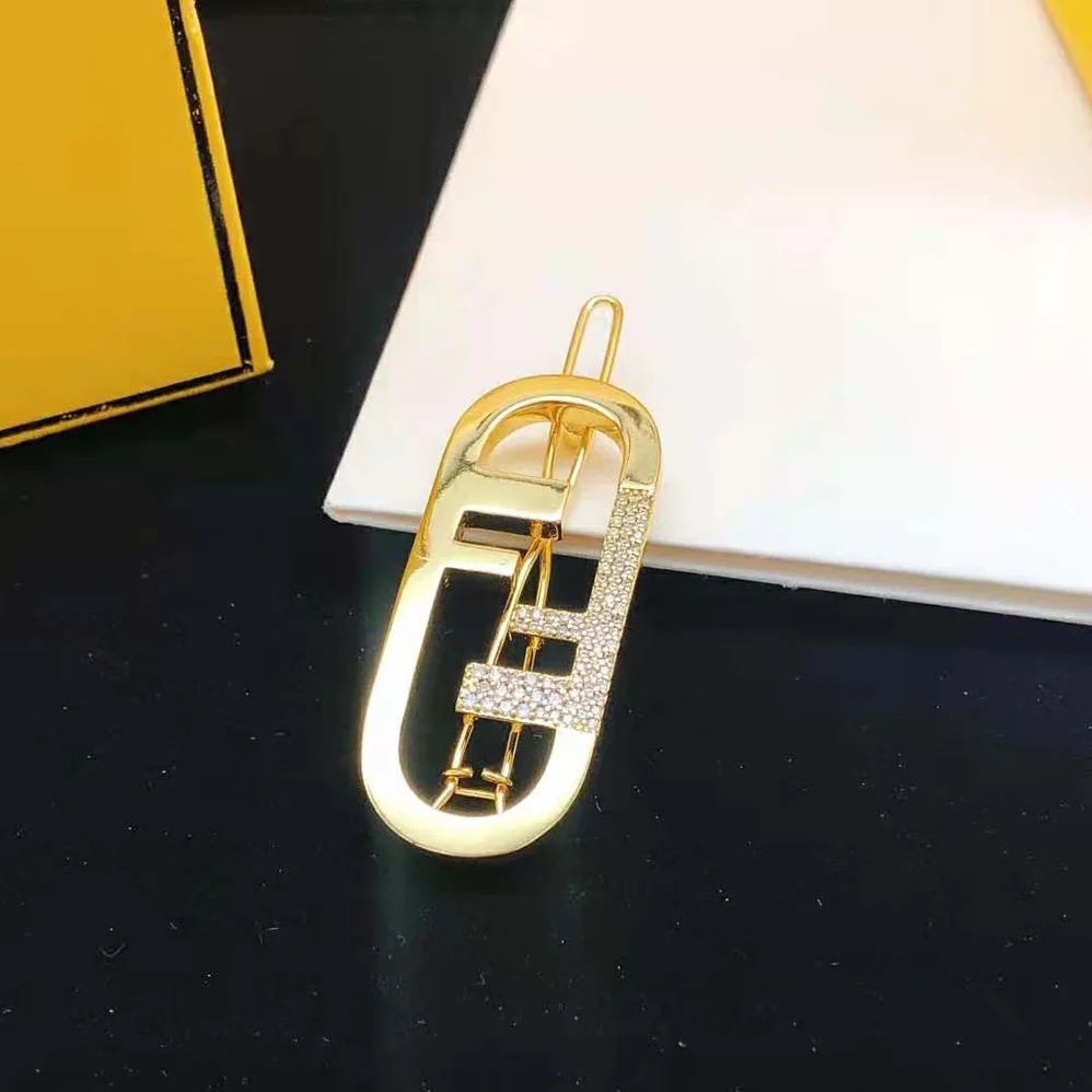 Fendi O'Lock Hair Clip Gold for Women in Coloured Fendi O'Lock Hair Clip Gold for Women in Coloured