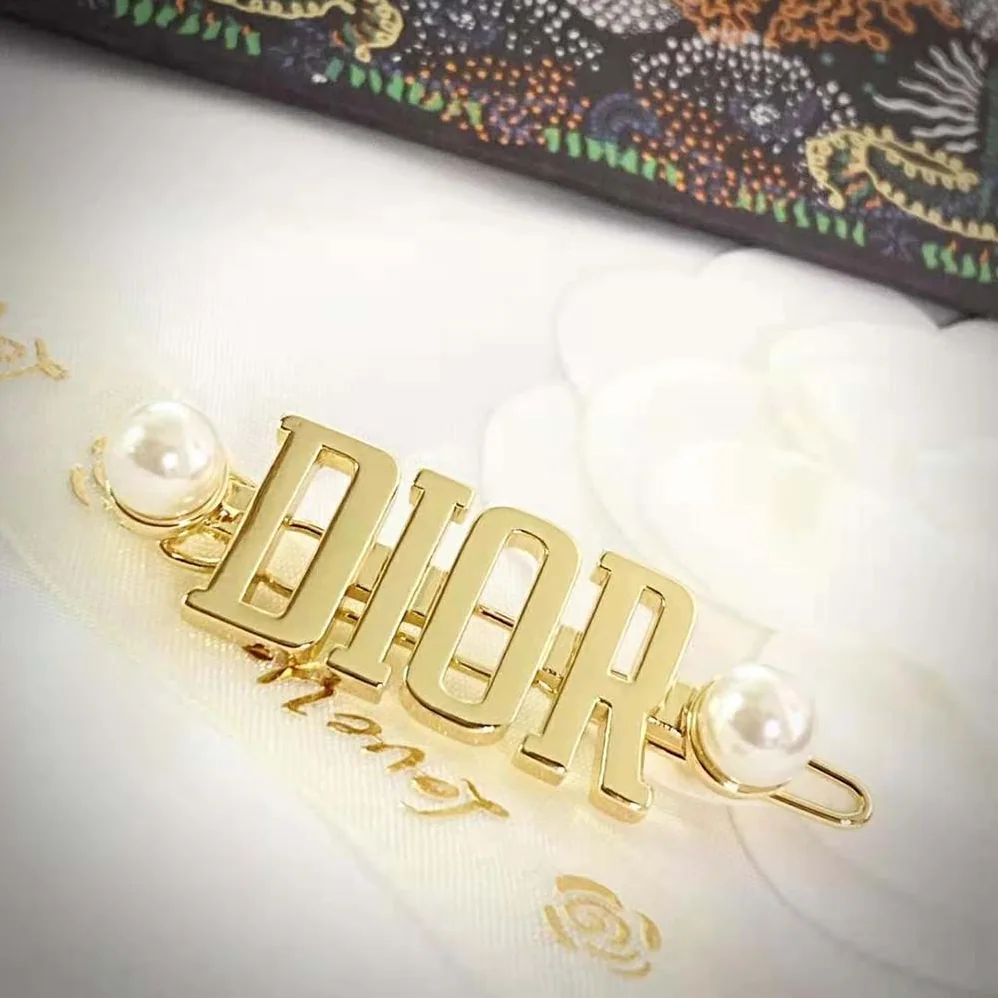 Dior Dio(r)evolution Barrette Gold-Finish Metal and White Resin Pearls for Women Dior Dio(r)evolution Barrette Gold-Finish Metal and White Resin Pearls for Women