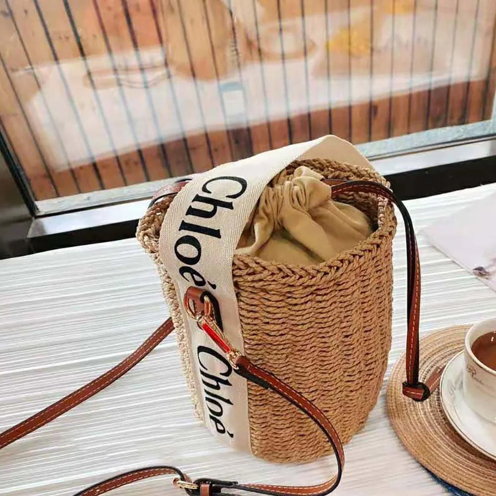 Chloe Small Woody Basket in Fair-trade Paper with the Woody Ribbon for Women Chloe Small Woody Basket in Fair-trade Paper with the Woody Ribbon for Women