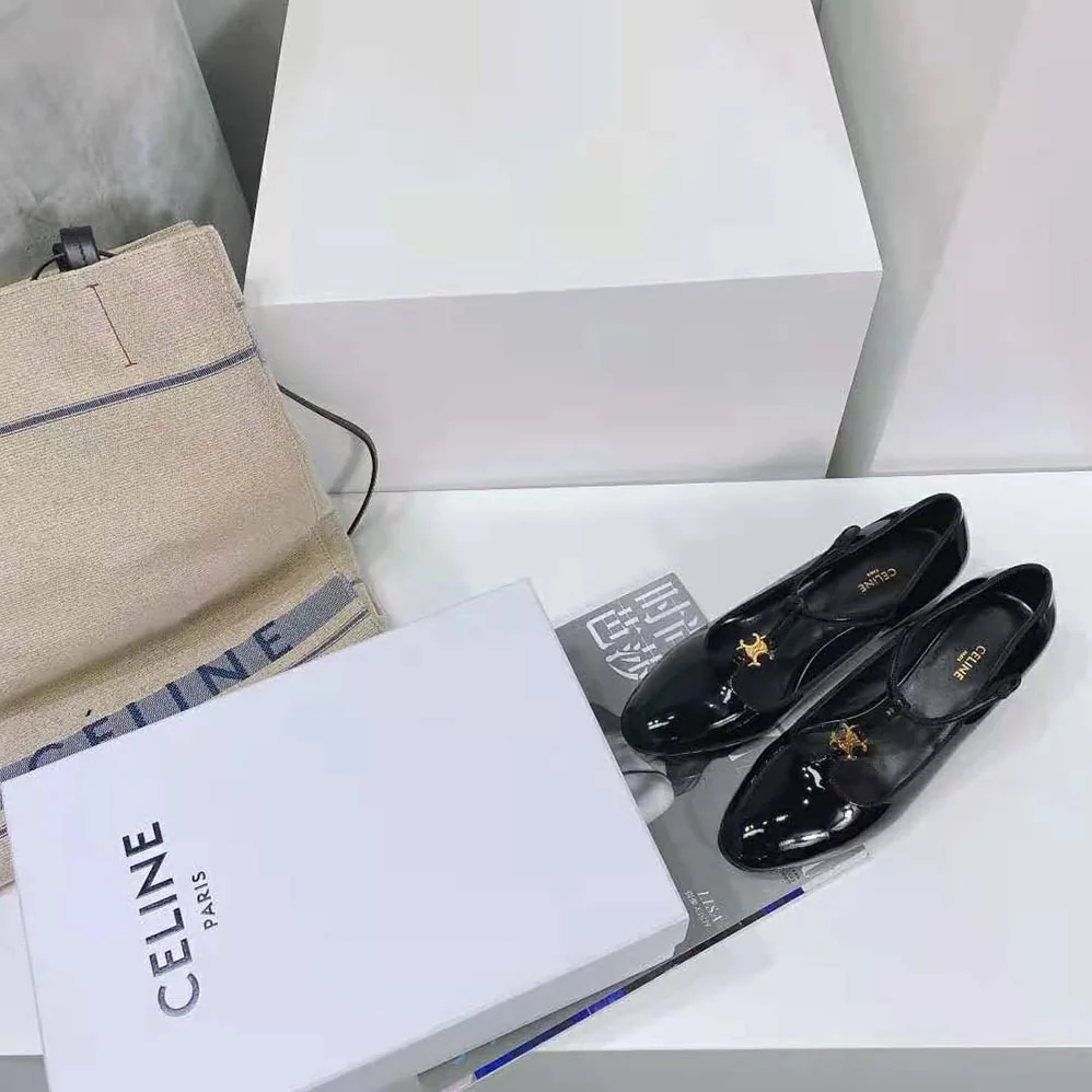 Celine Babies T-Bar Pump in Patent Calfskin and Grosgrain for Women in Black Celine Babies T-Bar Pump in Patent Calfskin and Grosgrain for Women in Black