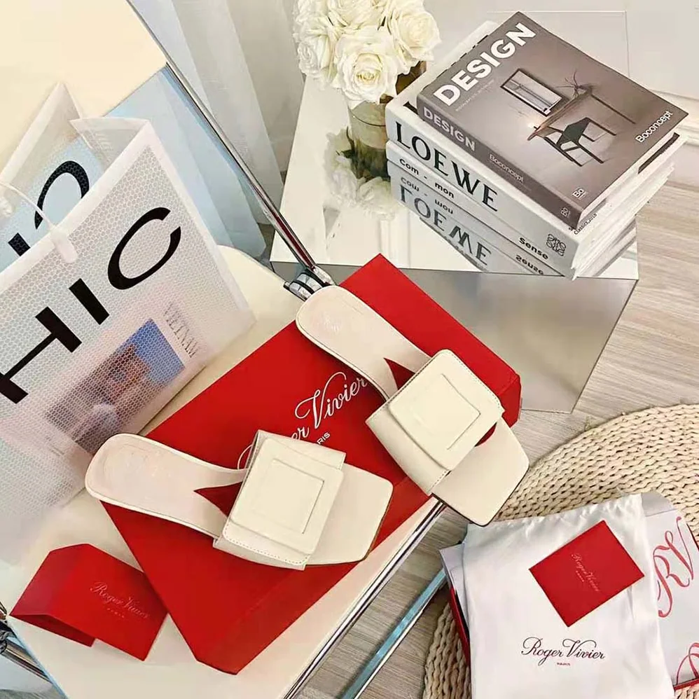 Roger Vivier Covered Buckle Mules in Patent Leather for Women in White Roger Vivier Covered Buckle Mules in Patent Leather for Women in White