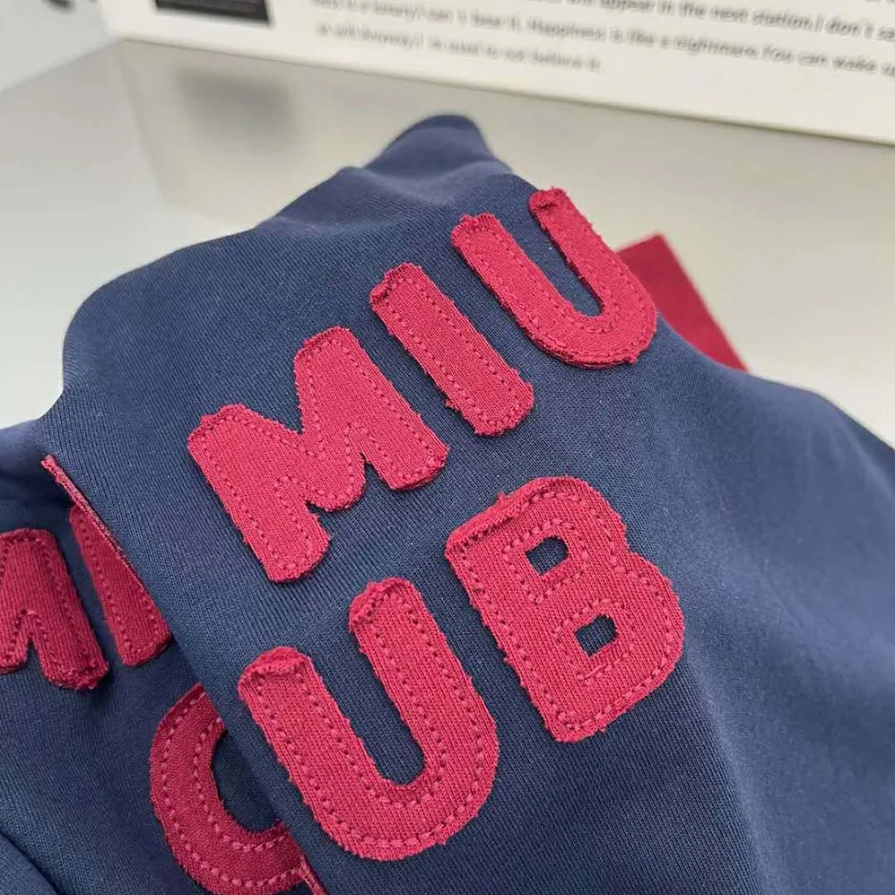 Miu Miu Jersey T-shirt with Embroidered Logo for Women in Navy Miu Miu Jersey T-shirt with Embroidered Logo for Women in Navy