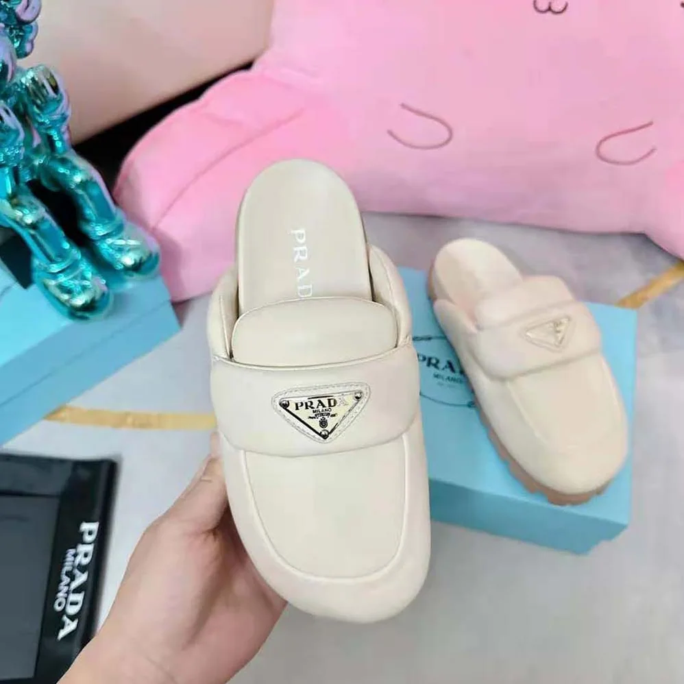 Prada Soft Padded Nappa Leather Sabots for Women in Beige Prada Soft Padded Nappa Leather Sabots for Women in Beige