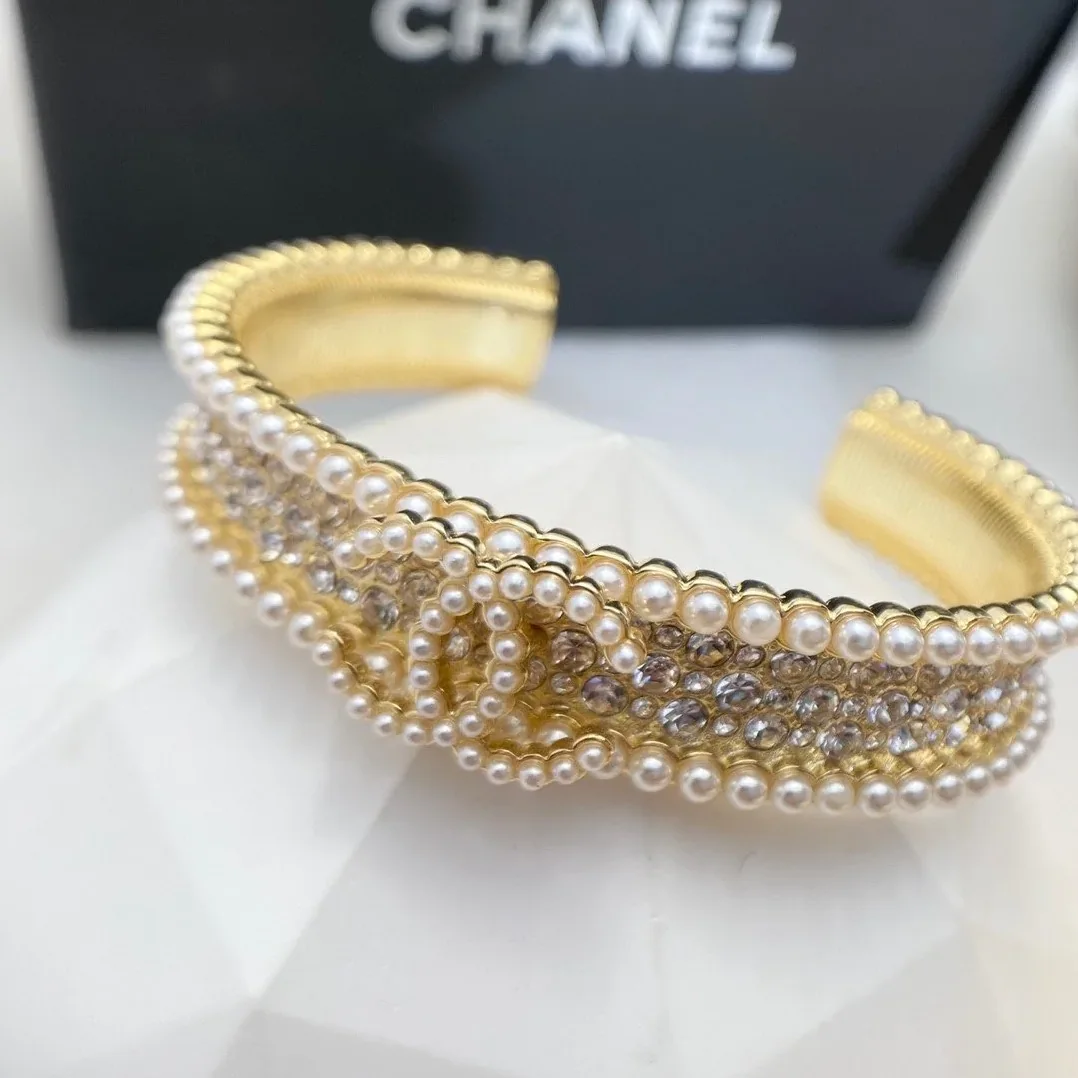 Chanel Pearl And Crystal Interlocking CC Cuff Bracelet Gold Hardware Chanel Pearl And Crystal Interlocking CC Cuff Bracelet Gold Hardware
