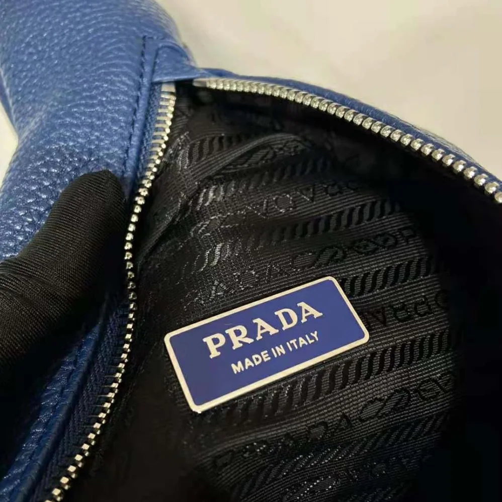 Prada Cross Leather Bag wite Logo-Print Re-Nylon lining for Men in Navy