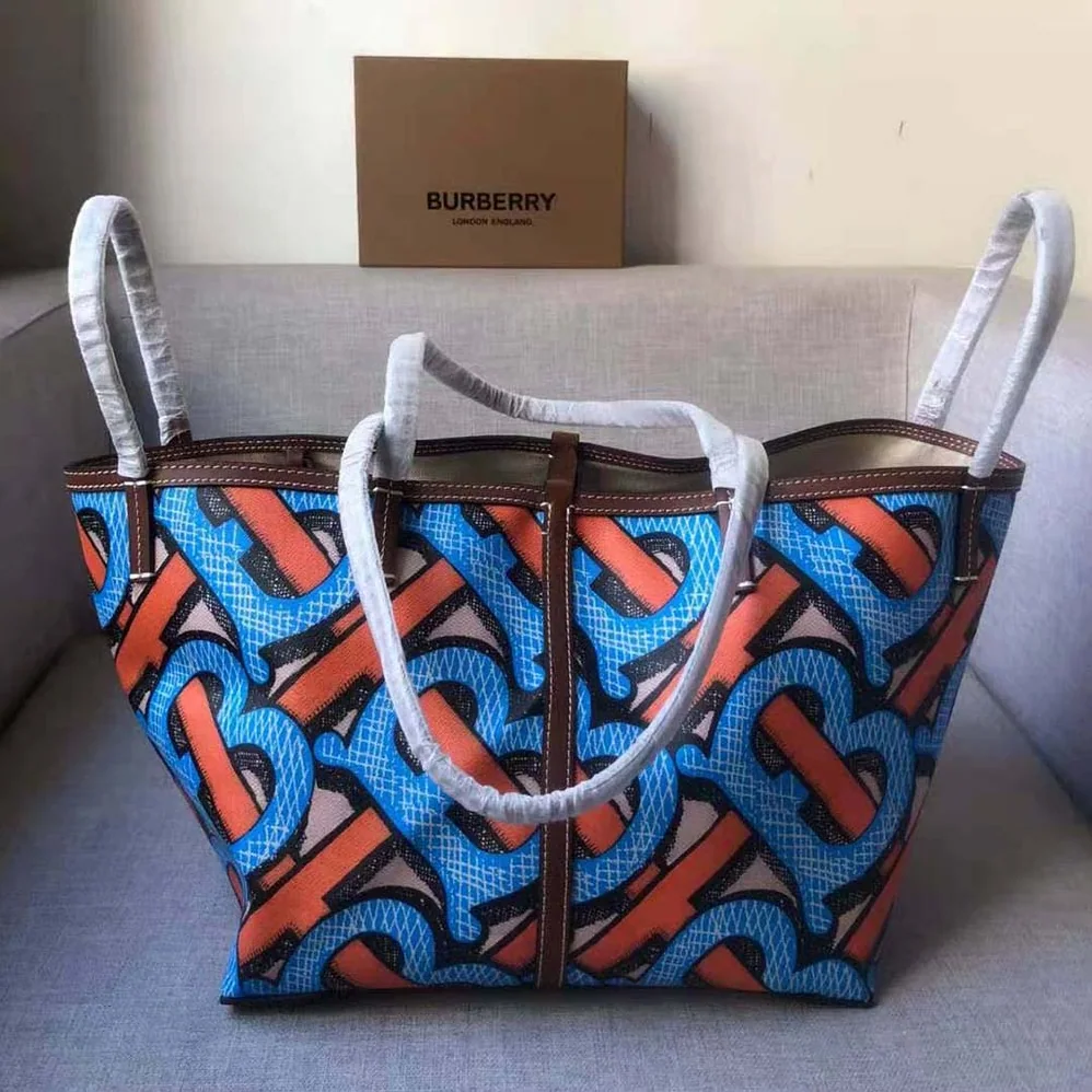 Burberry Mini Monogram Print E-canvas Beach Tote for Women in Orange