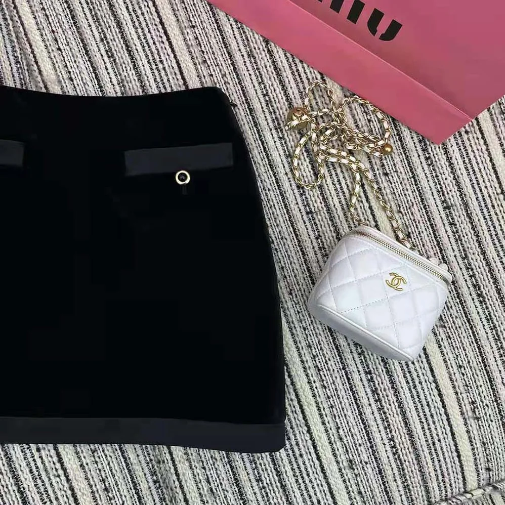 Miu Miu Velvet Miniskirt with Knit Logo Label for Women in Black