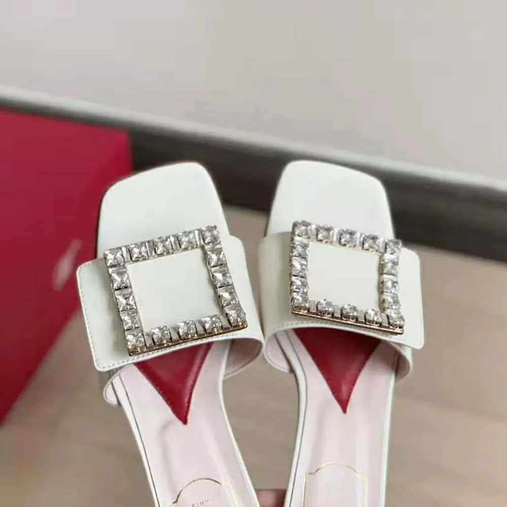 Roger Vivier Biki Love Strass Buckle Mules in Leather for Women in White Roger Vivier Biki Love Strass Buckle Mules in Leather for Women in White
